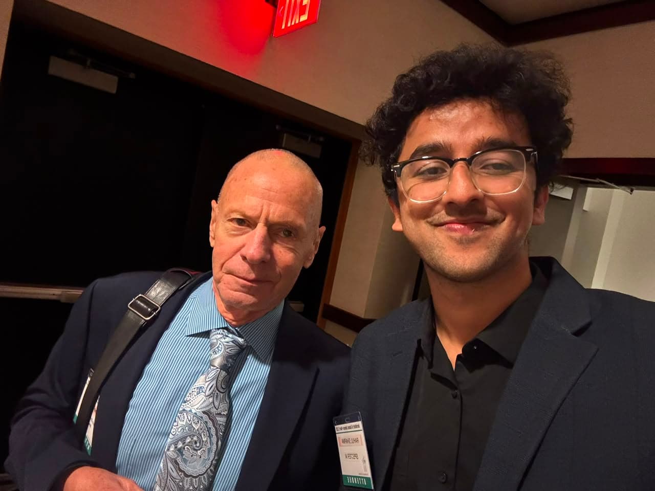 Rahul Sharma with an attendee at the Asbestos Litigation Conference