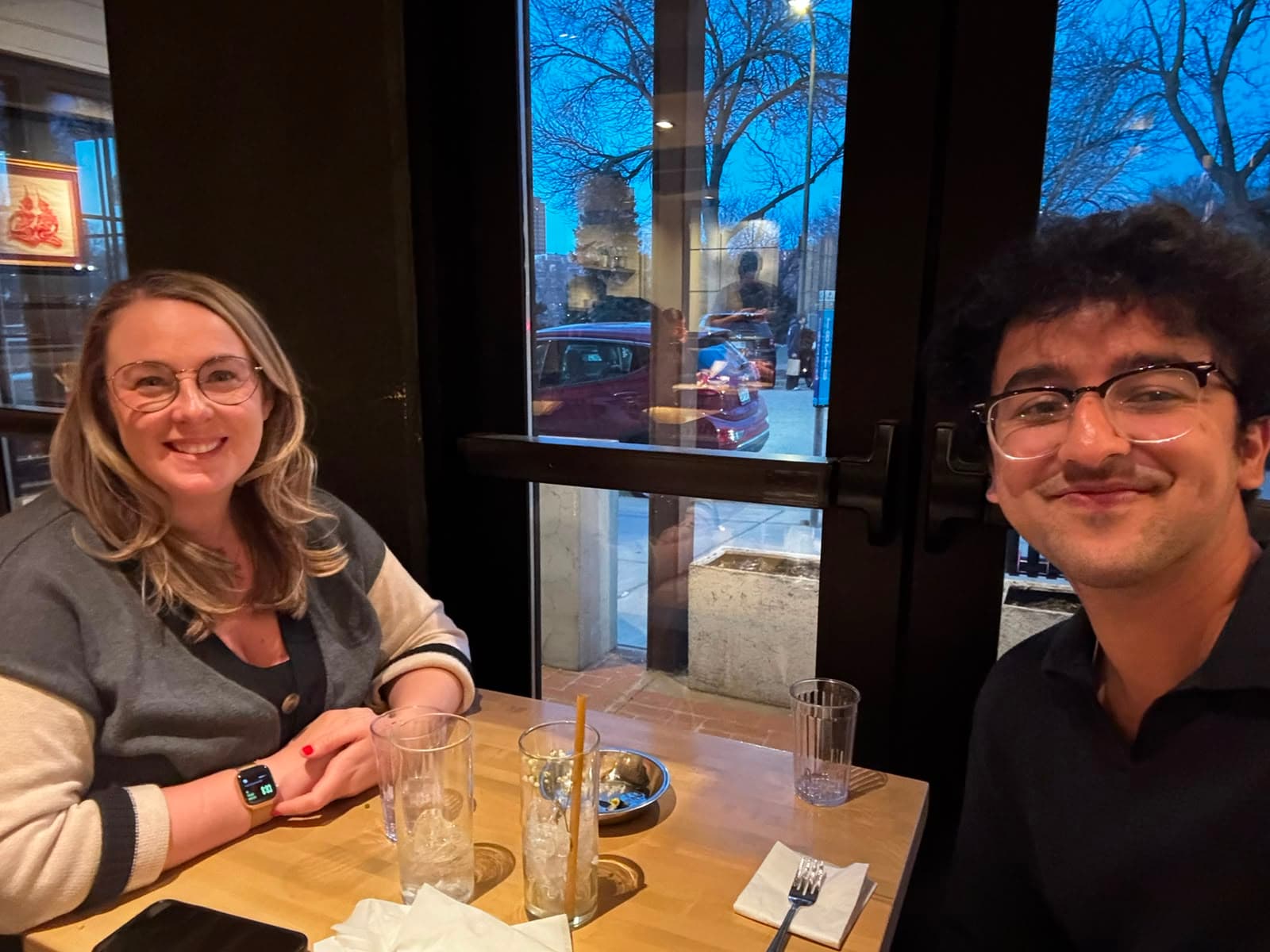 Rahul Sharma at a working dinner with a plaintiff-side attorney